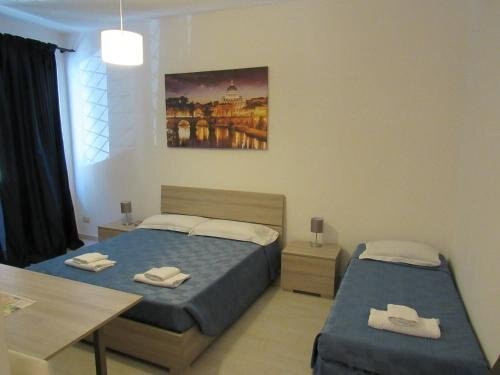 PIANETA ROMA 39 Room Type - Deluxe Double Room with Extra Bed PIANETA ROMA 39 Room Type - Deluxe Double Room with Extra Bed