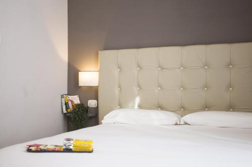 Colosseo Prestige Rooms - Tap to explore photos