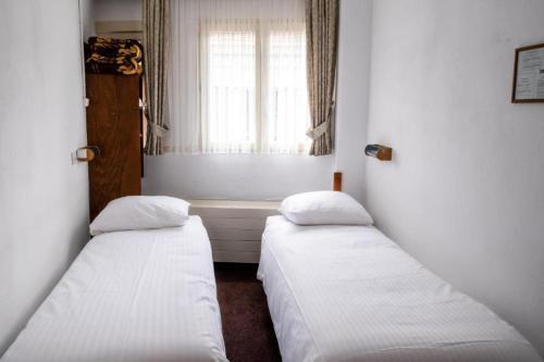 Budget Hotel Ben - Tap to explore photos