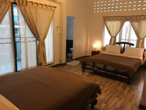 Lamphuhouse Bangkok Room Type - Quadruple Room with Terrace