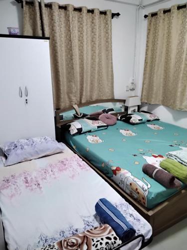 Danee Hostel Room Type - Triple Room with Balcony