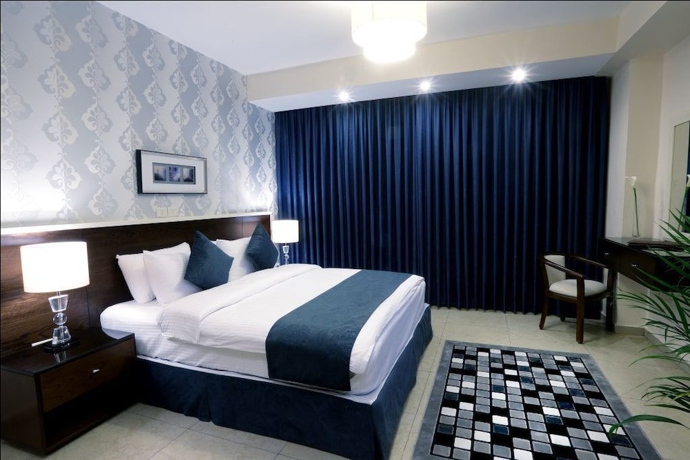 City Rose Hotel Suites - Tap to explore photos