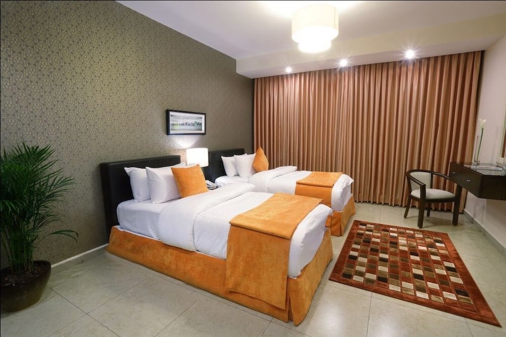 City Rose Hotel Suites Room Type - Suite, 2 Bedrooms, City View