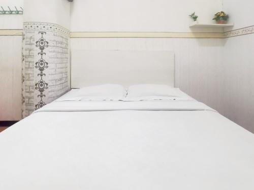 Kartini Residence RedPartner Room Type - Deluxe Double Room