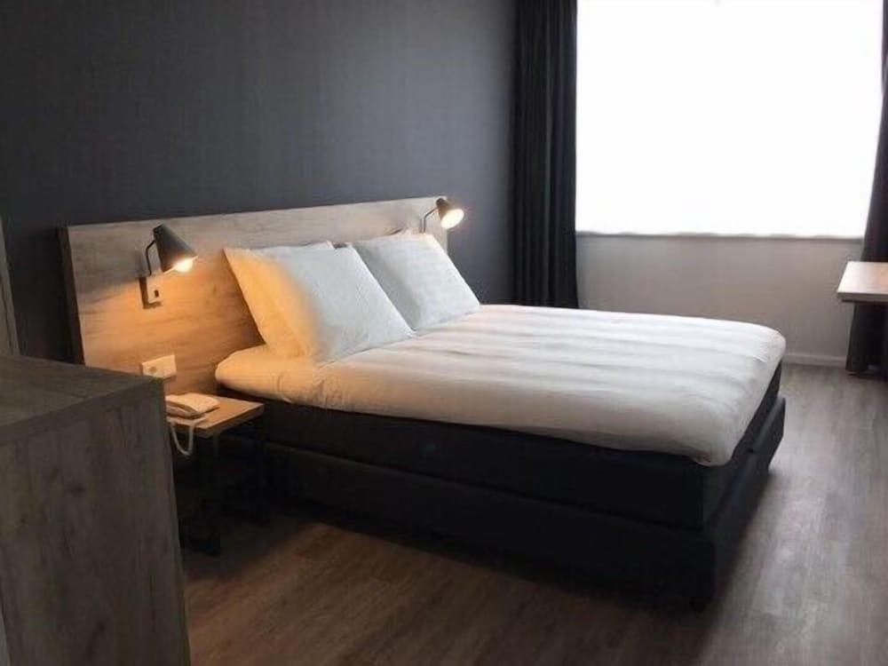 Joy Hotel - Tap to explore photos