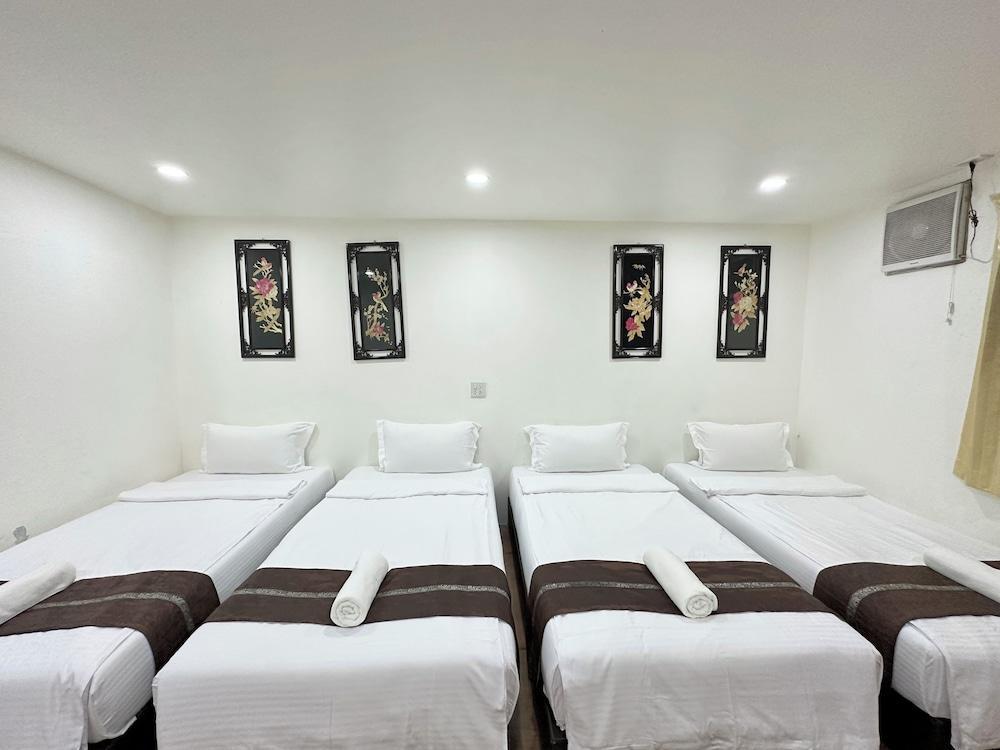Longzhu Guesthouse Room Type - Deluxe Quadruple Room