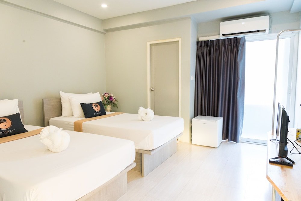 RoomQuest Bangkok Don Mueang Airport 1 - Tap to explore photos