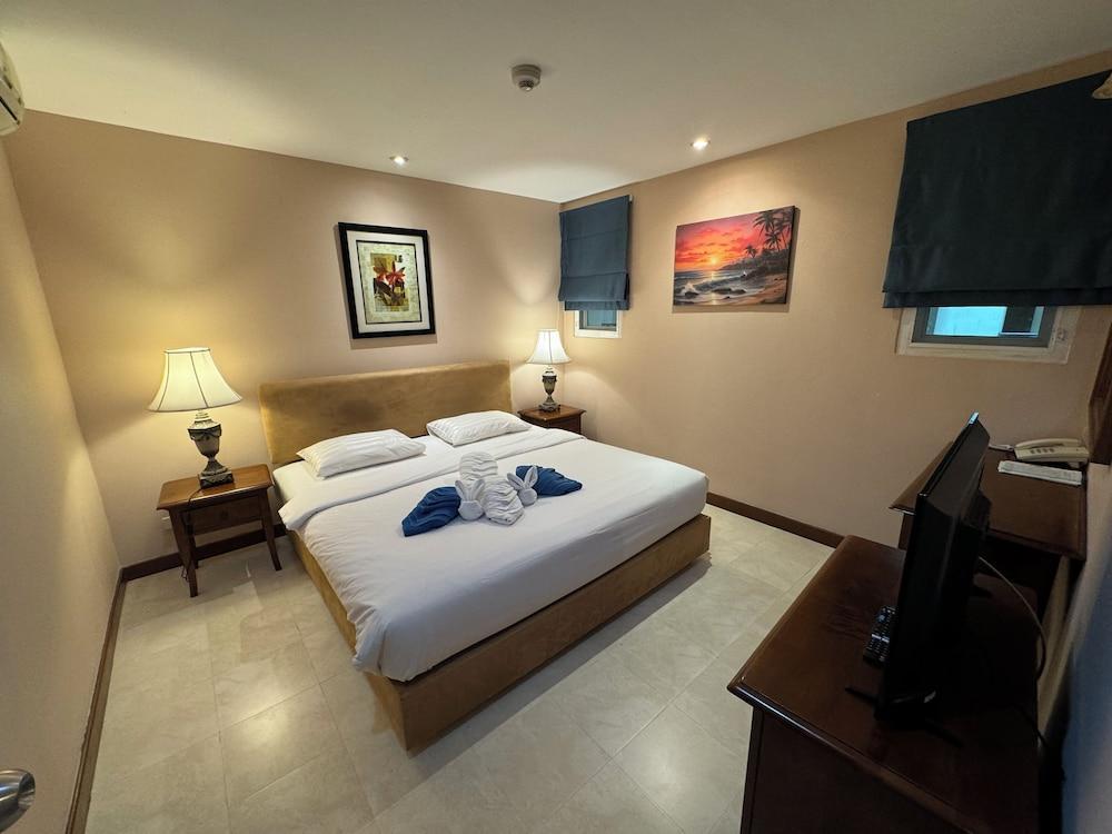Jomtien Beach Residence - Tap to explore photos