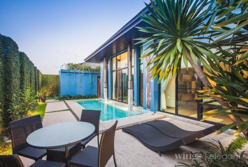 One Bedroom Wings Pool Villa - Tap to explore photos