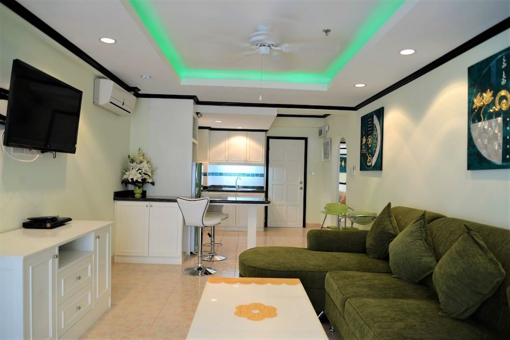 Sleek 1 bed Condo Jomtien - Tap to explore photos