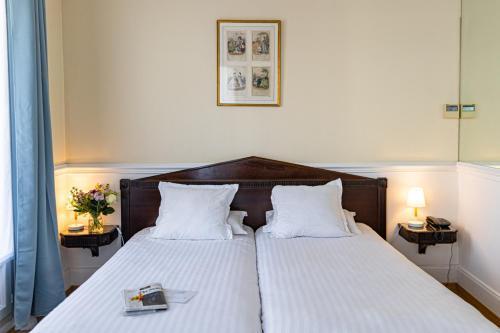 Hotel Claude Bernard Saint Germain - Tap to explore photos