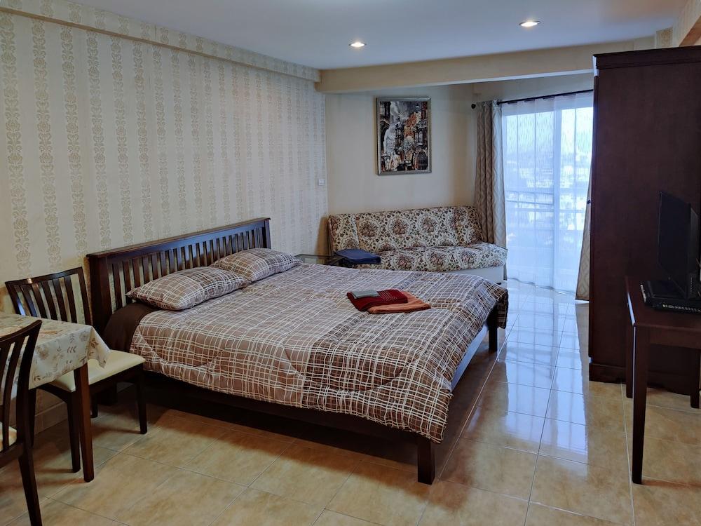 Jomtien Beach Condominium - Tap to explore photos