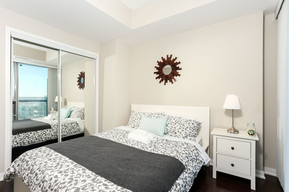 Platinum Suites - Modern Luxury High Rise Condo - Tap to explore photos