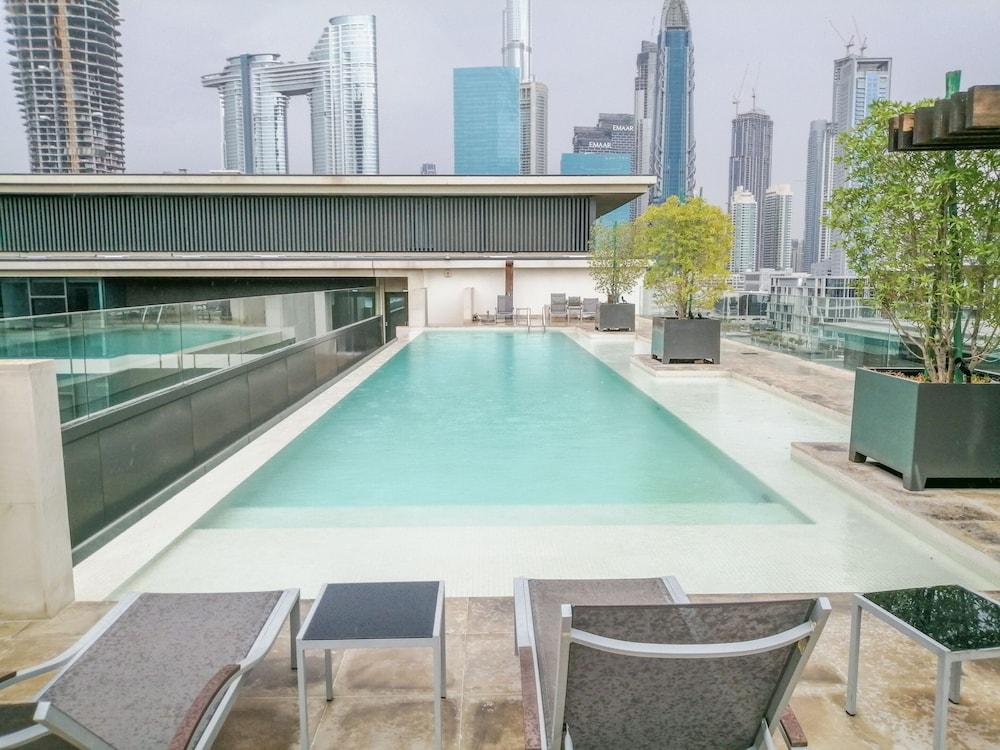 Nasma Luxury Stays - City Walk - Tap to explore photos