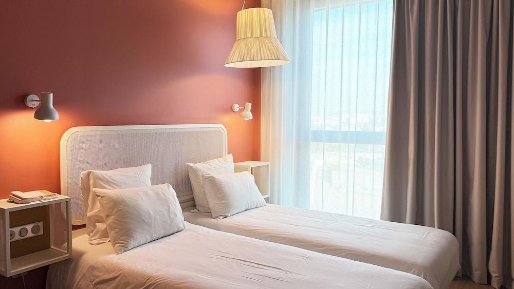 OKKO Hotels Paris Gare de l'Est - Tap to explore photos