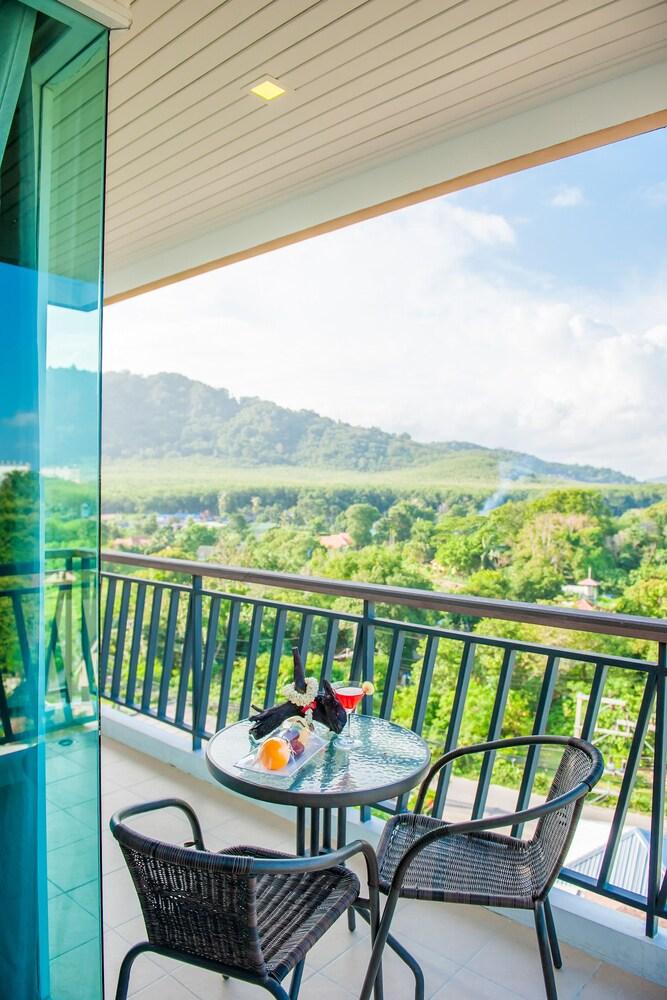 Grand Nai Harn Suites - Tap to explore photos