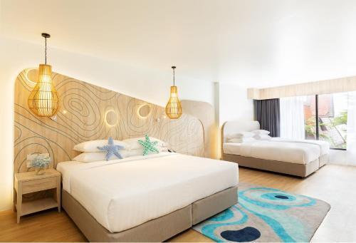 LIV Hotel Phuket Patong Beachfront - Tap to explore photos