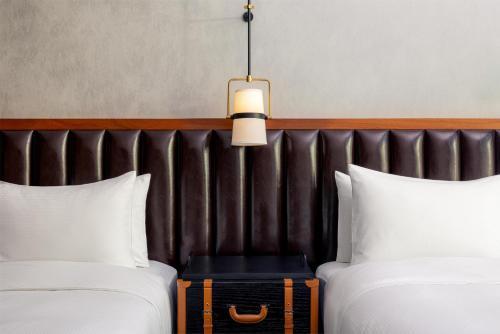 DoubleTree by Hilton Dubai M square Hotel & Residences - Tap to explore photos