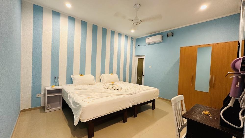 Midsummer Thulusdhoo Room Type - Deluxe Room