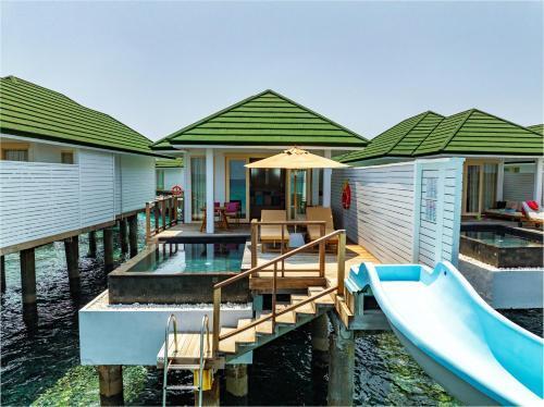 Siyam World Maldives Room Type - Lagoon Villa Pool + Slide - Free shared seaplane for 2 guests, minimum 7-night stay Siyam World Maldives Room Type - Lagoon Villa Pool + Slide - Free shared seaplane for 2 guests, minimum 7-night stay