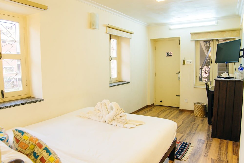 OYO 159 Highlander Inn - Tap to explore photos