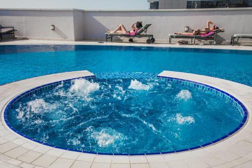 Elite Byblos Hotel - Tap to explore photos