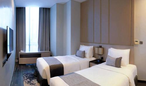 Mangkuluhur Residences by Lorin Room Type - Residences Business Twin