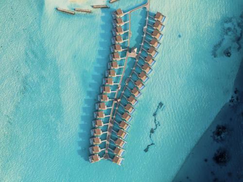 Kuda Villingili Resort, Maldives Room Type - Sunrise Water Villa with Private Pool  - Kids Stay & Dine Free, Complimentary KV Faru Snorkeling