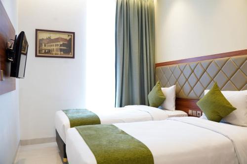 Luxury Inn Arion Hotel - Tap to explore photos