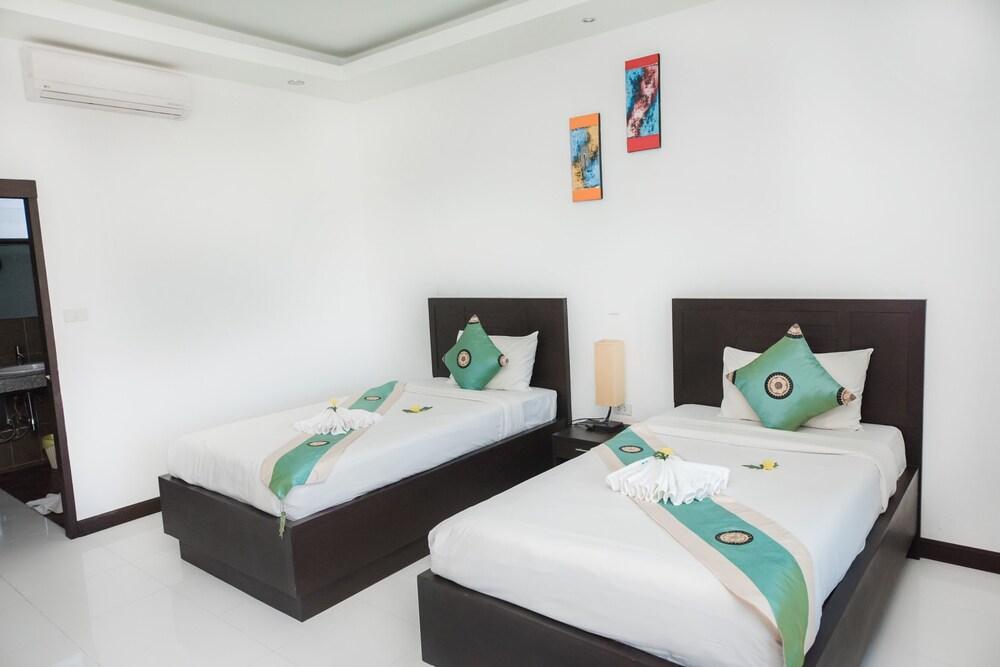 Phuket Monaburi Boutique Hotel - Tap to explore photos