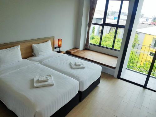 Atom Phuket Hotel Room Type - Twin Room with Pool View Atom Phuket Hotel Room Type - Twin Room with Pool View