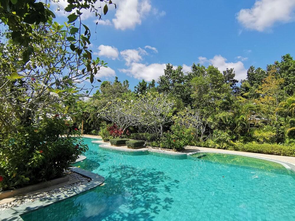 T Resort Palai - Tap to explore photos