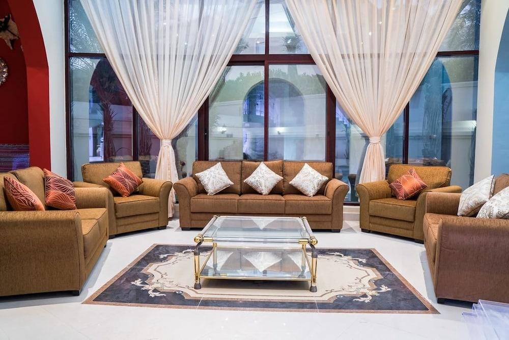 Emirates Hills Lake View Villa - Tap to explore photos