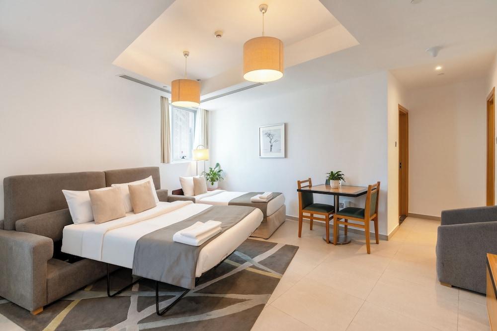 Grand Heights Dubai Hotel Apartments - Tap to explore photos