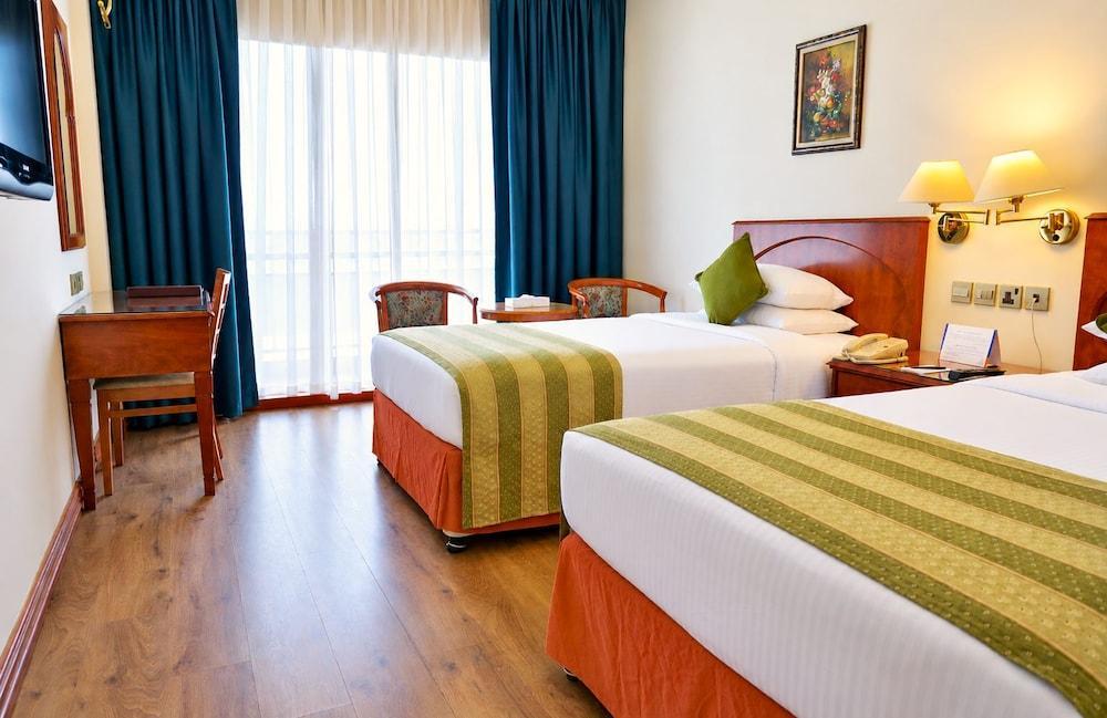 Riviera Hotel Room Type - Standard Creek View - Twin Bed With Balcony + Free Shuttle Bus To Al Mamzar Beach Riviera Hotel Room Type - Standard Creek View - Twin Bed With Balcony + Free Shuttle Bus To Al Mamzar Beach