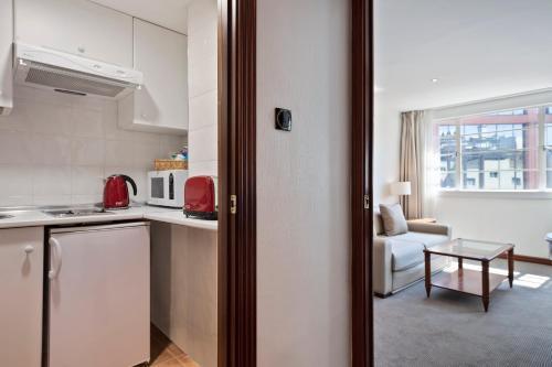 Meliá White House Apartments - Tap to explore photos