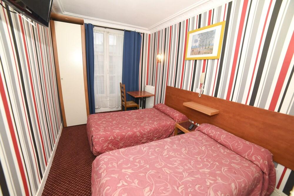 Sully Hôtel - Tap to explore photos