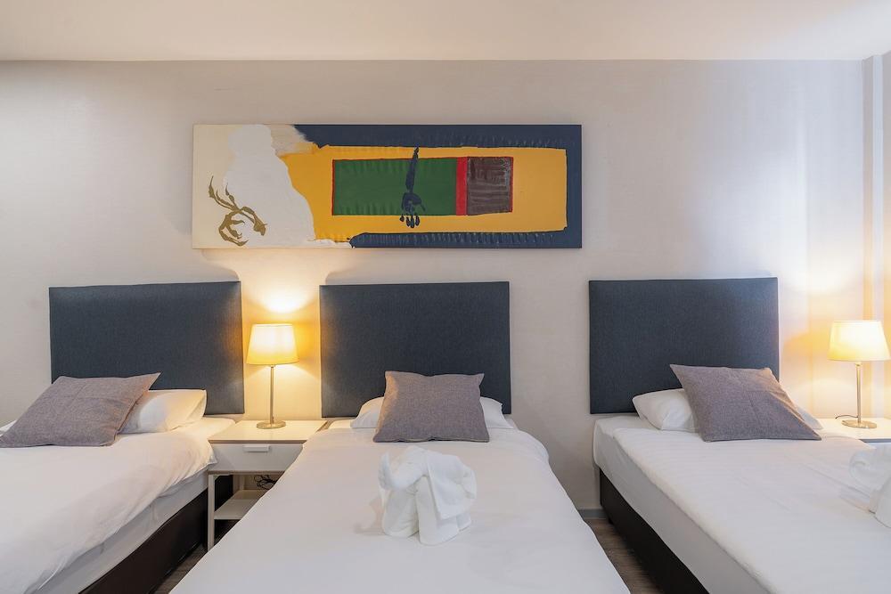 Ratchadamnoen Residence Room Type - Superior Triple Room - (Top Floor)