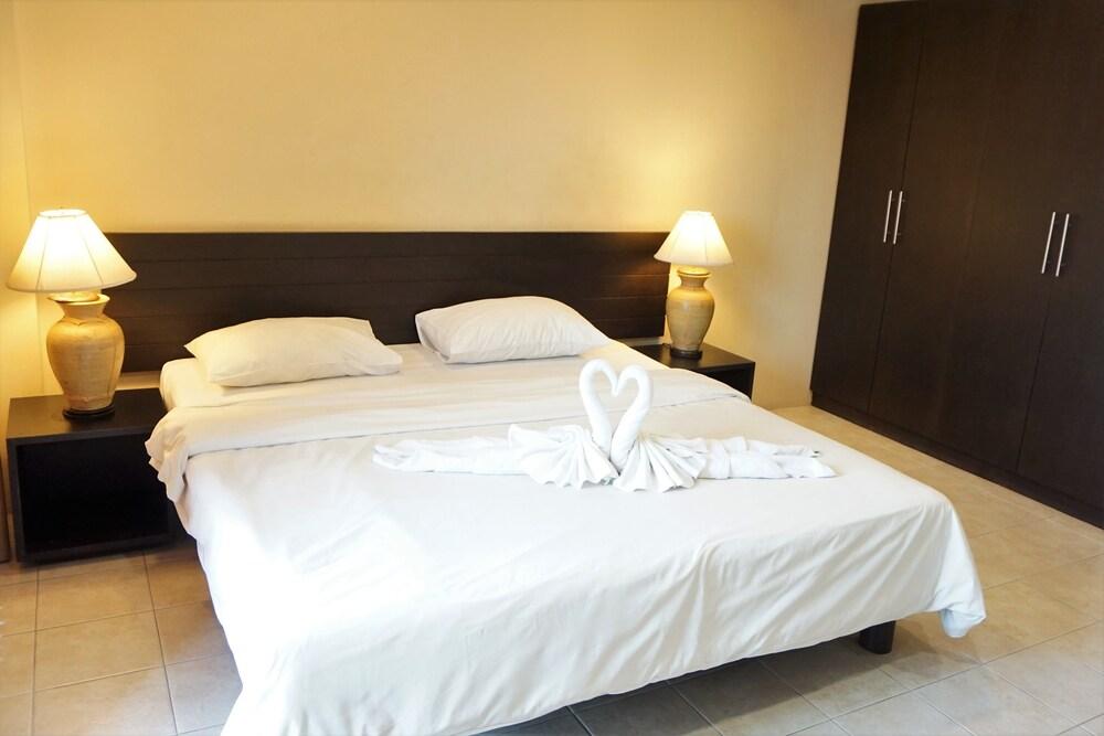 Chaofa West Suites - Tap to explore photos