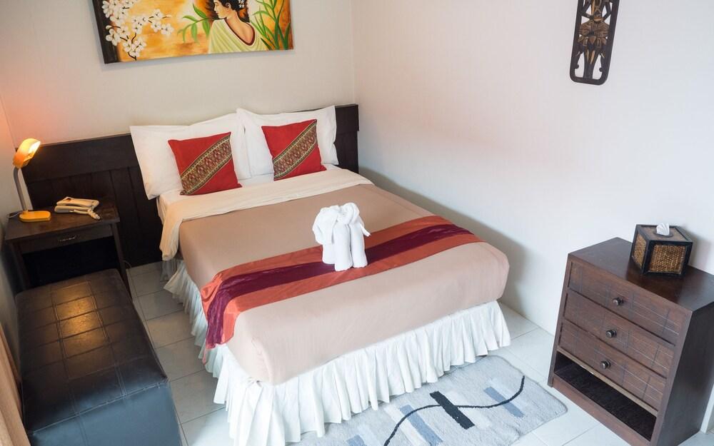 The Nice Patong Hotel - Tap to explore photos