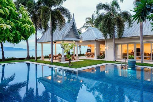 Miskawaan Beachfront Villas - Tap to explore photos