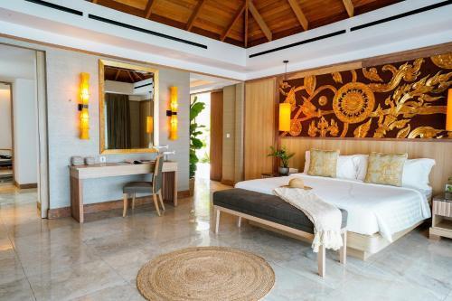 Miskawaan Beachfront Villas - Tap to explore photos