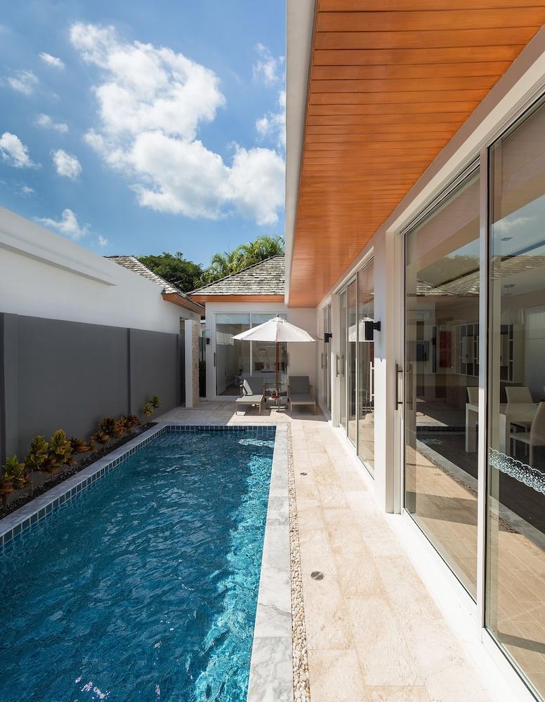 Signature Villas by TropicLook - Tap to explore photos