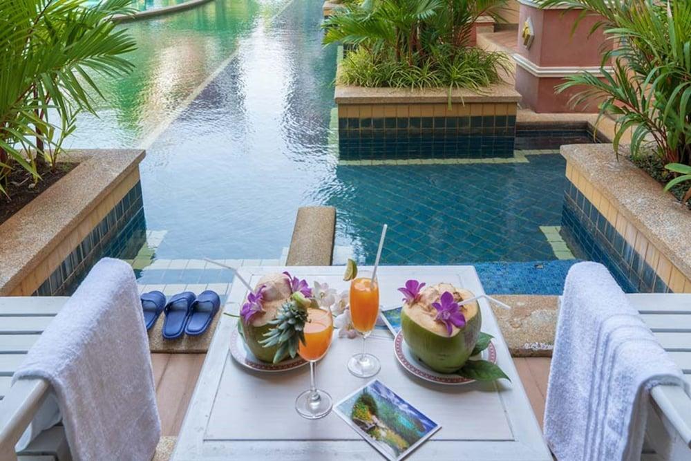 Krabi Nature Beach Resort - Tap to explore photos