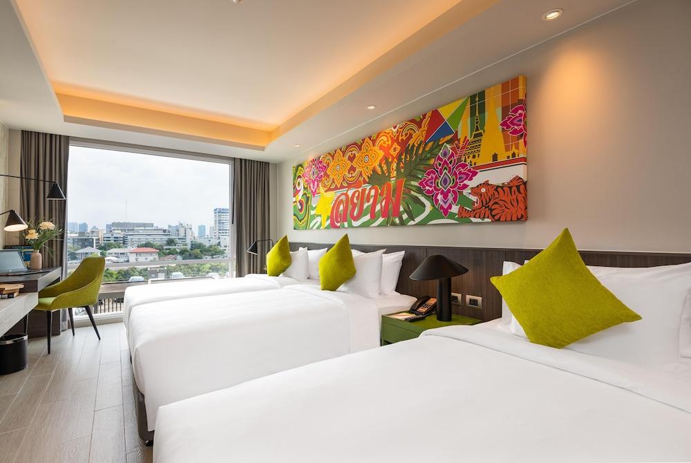 Maitria Hotel Rama 9 - A Chatrium Collection Room Type - Deluxe Triple City View