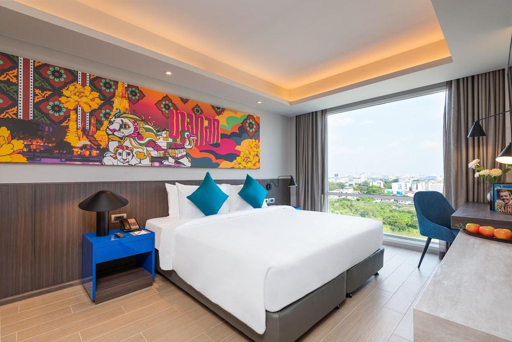 Maitria Hotel Rama 9 - A Chatrium Collection Room Type - Grand Deluxe Garden View King Bed