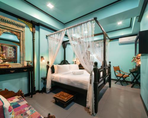 De Phanakron Boutique Hotel - Tap to explore photos