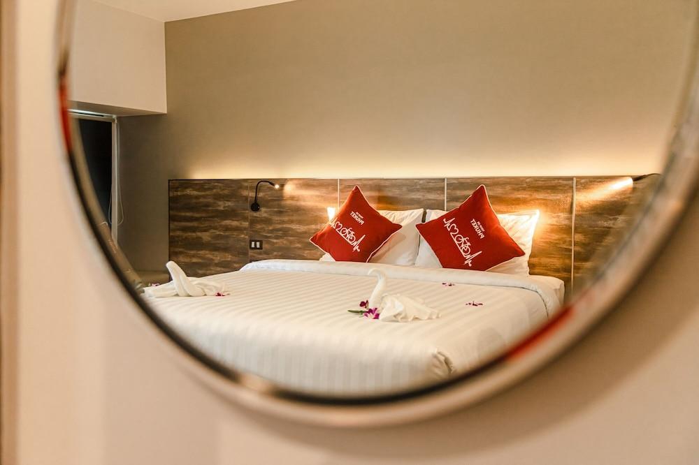 Tour De Phuket Hotel - Tap to explore photos