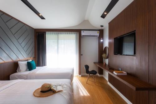 The Canale Samui Resort - Tap to explore photos