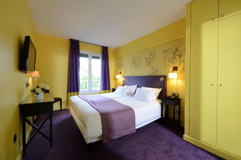 Hôtel Orchidée Room Type - Family Room Hôtel Orchidée Room Type - Family Room